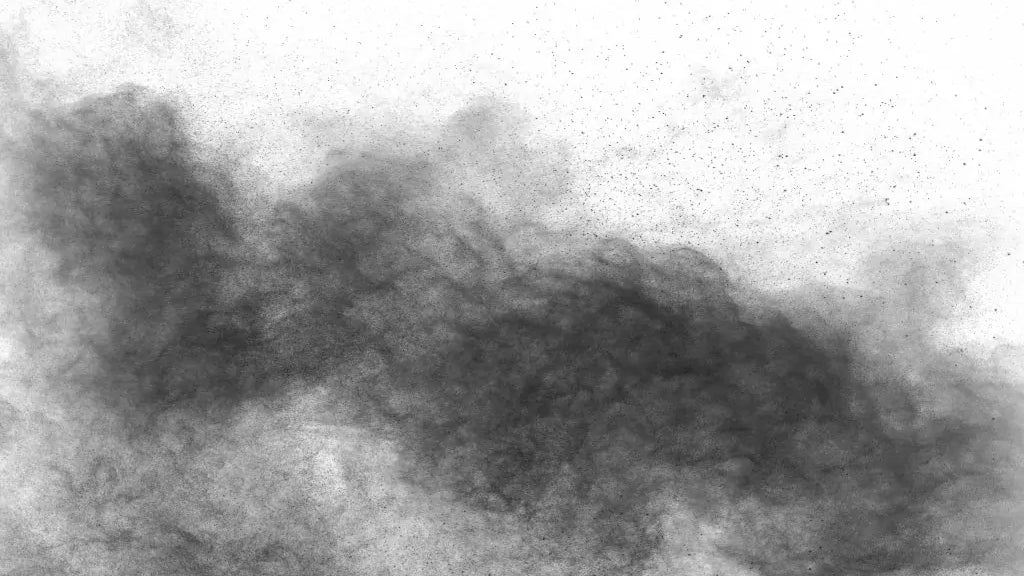 A black cloud of dust expelled by an industrial air cleaner.