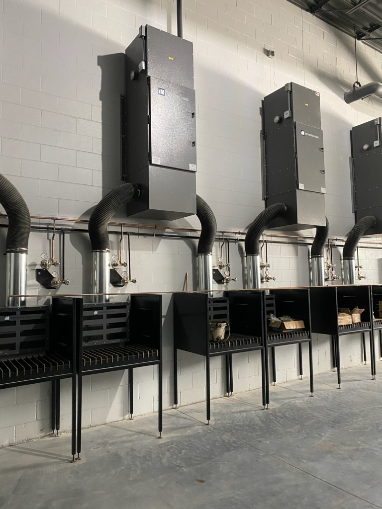 A vocational School has personalized air filtration for individual work stations