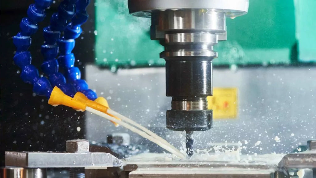 A factory utilizes a CNC milling machine with an air cleaner for maintaining clean shop air.